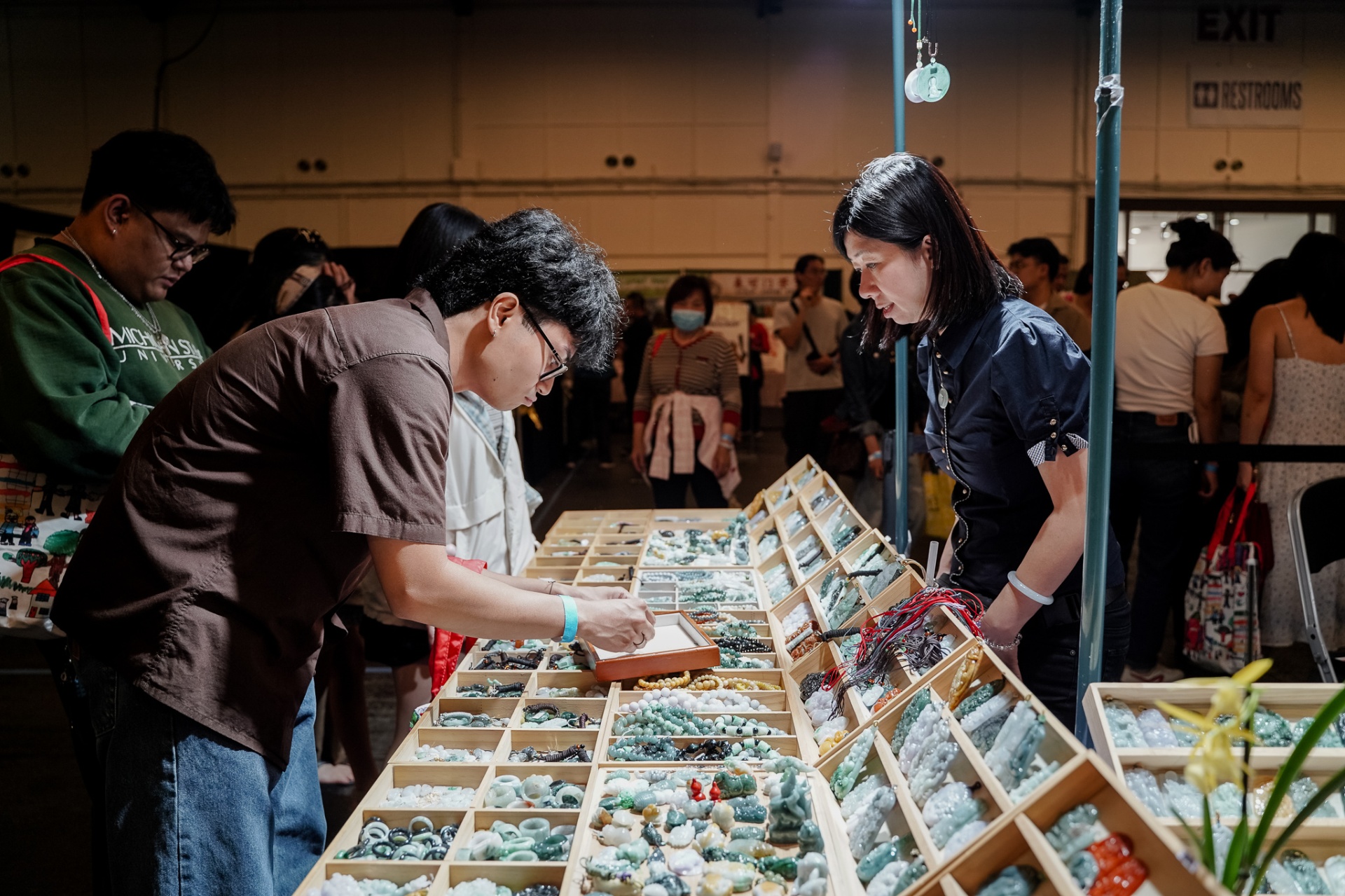 Guests browsing jade jewelry at the marketplace