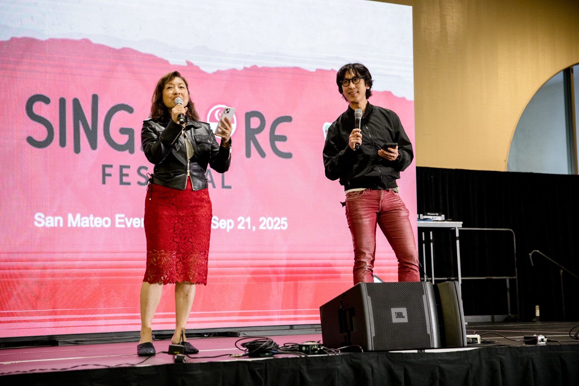 Hosts on stage at Singapore Festival, San Mateo Sep 21, 2025