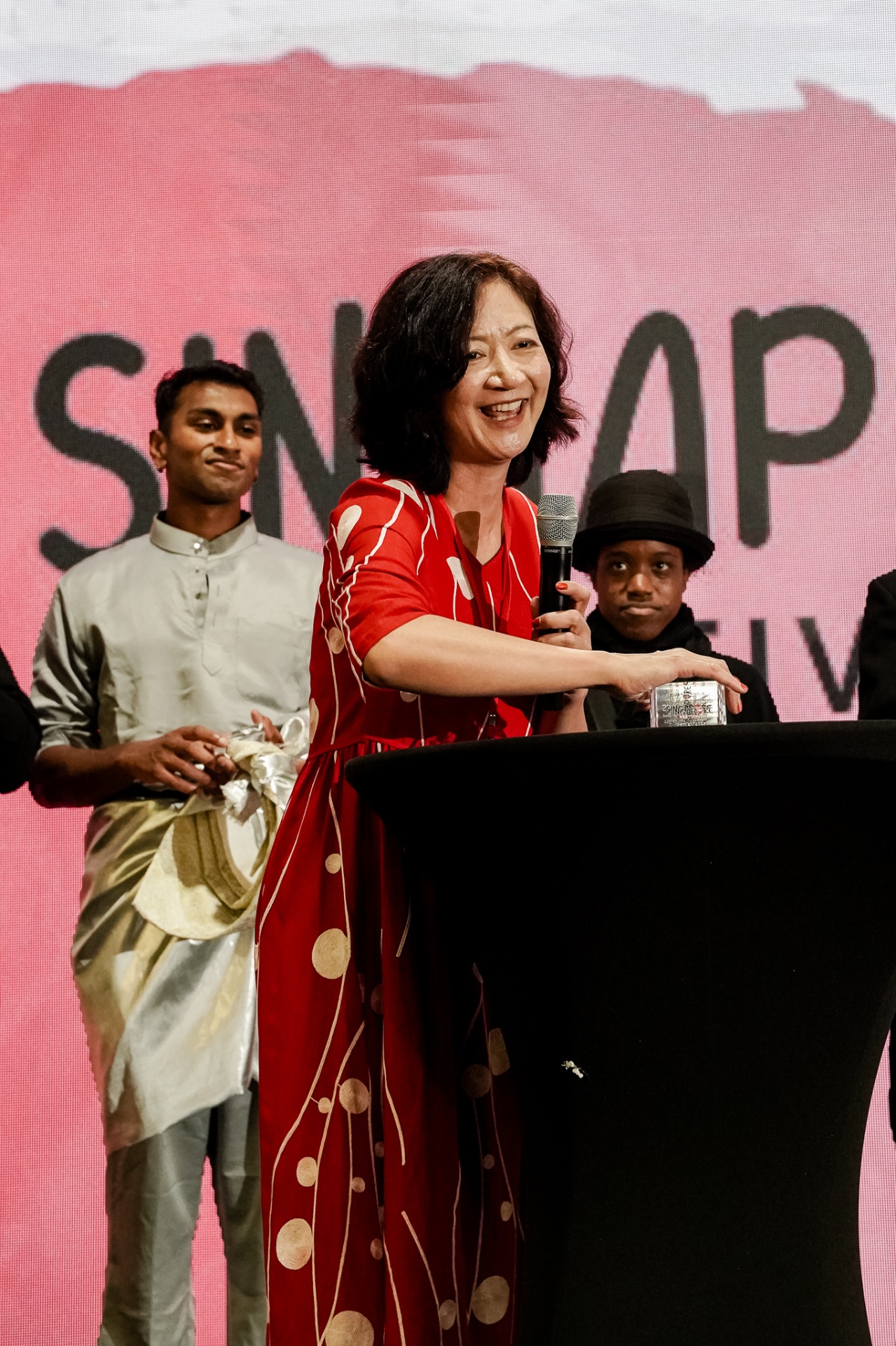 Speaker addressing the crowd at Singapore Festival
